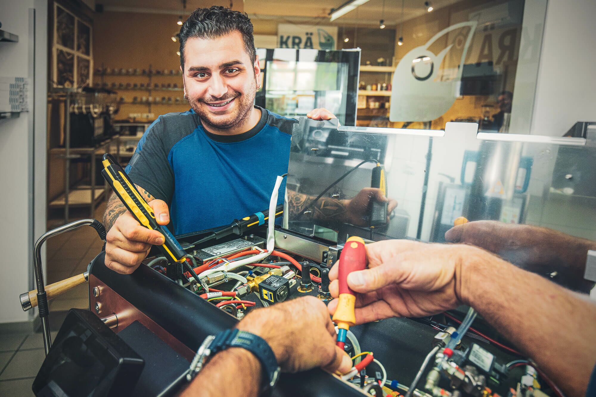 Employee works on machine
